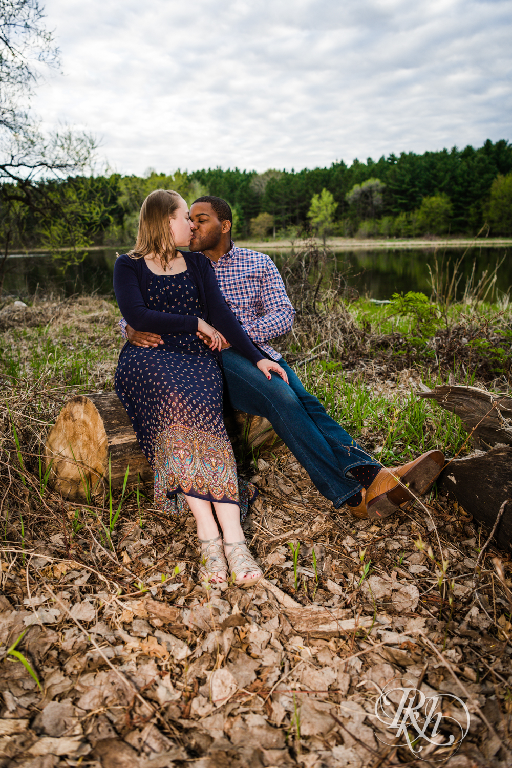Biracial couple kiss at Lebanon Hills Regional Park in Eagan, Minnesota.