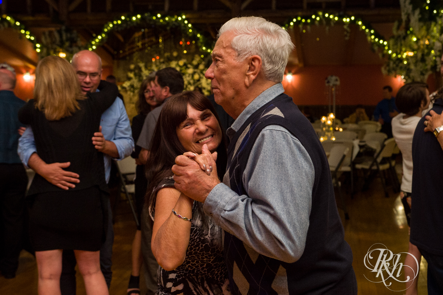 Guests dance during wedding reception at Memories Ballroom in Port Washington, Wisconsin. 