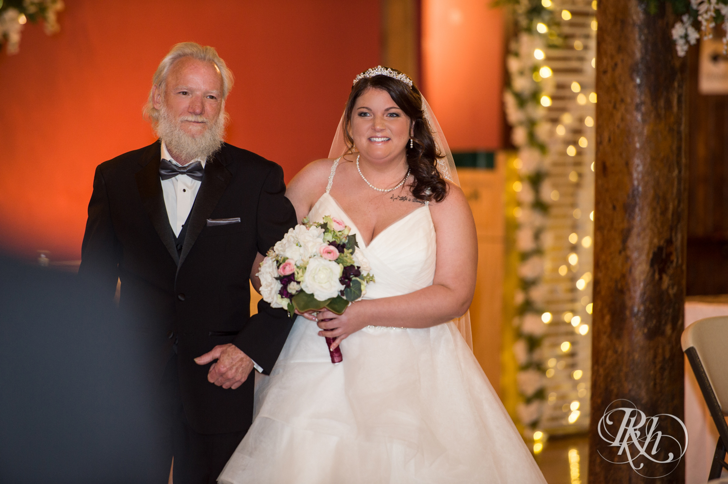 Bride and dad walking down the aisle at Memories Ballroom in Port Washington, Wisconsin