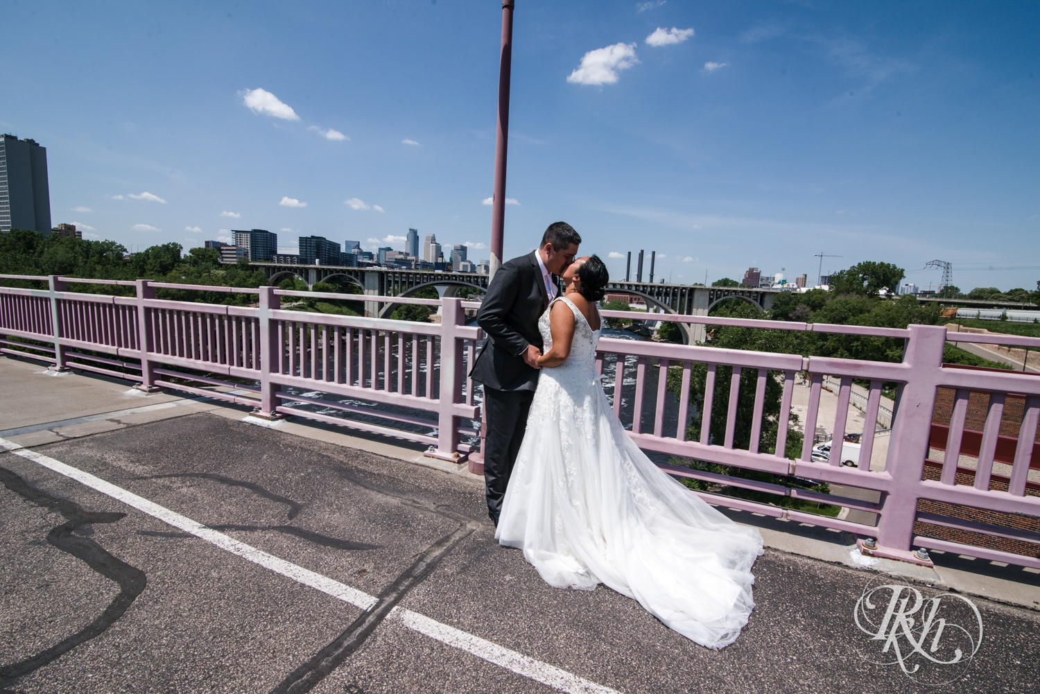 Bride and groom share first look on the 10th Avenue Bridge in Minneapolis, Minnesota.