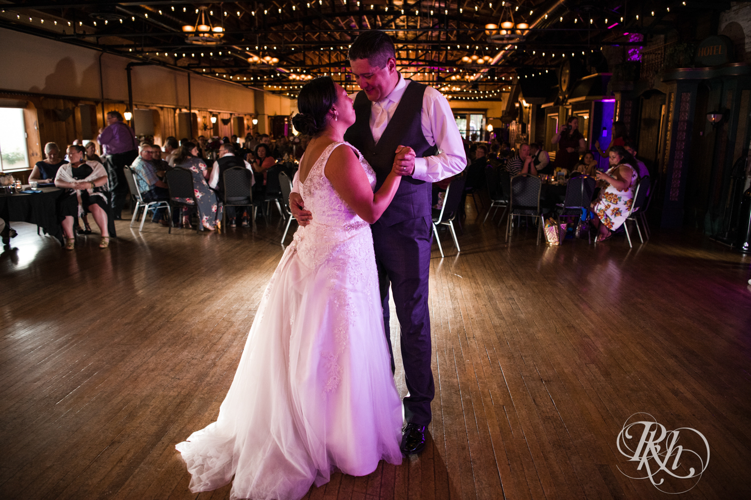 Bride and groom dance during wedding reception at Kellerman's Event Center in White Bear Lake, Minnesota.