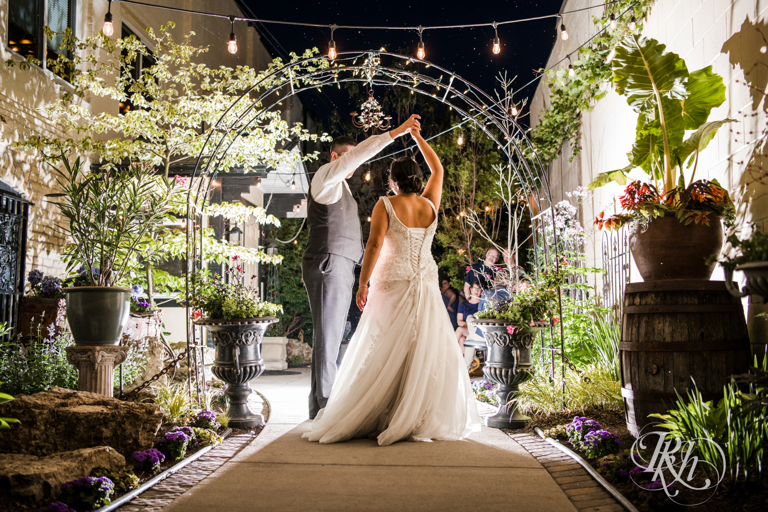 Bride and groom dance outside at night at Kellerman's Event Center in White Bear Lake, Minnesota.