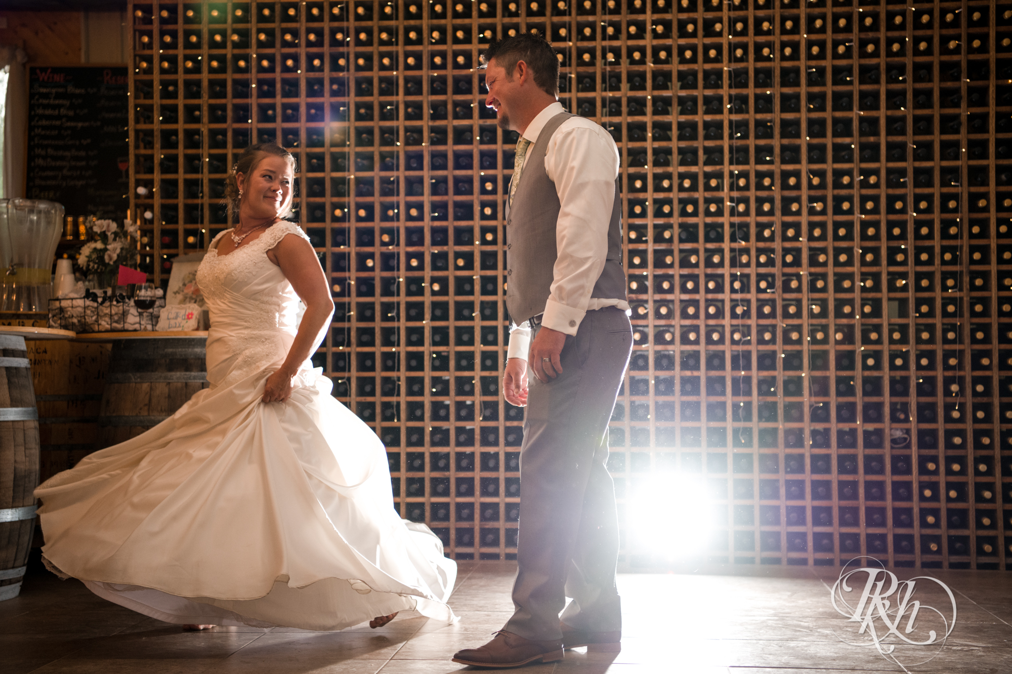 Bride and groom sharing first dance at Next Chapter Winery in New Prague, Minnesota.