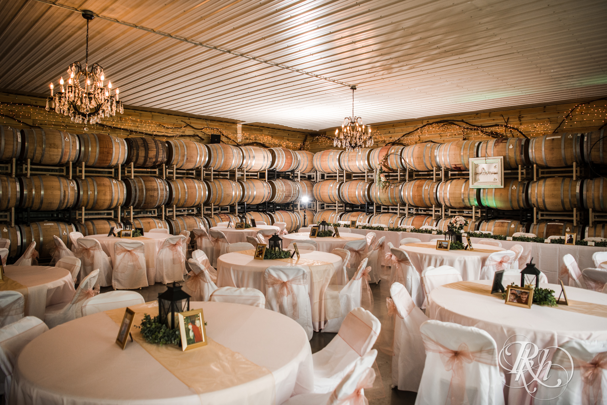 Indoor summer wedding reception setup at Next Chapter Winery in New Prague, Minnesota.