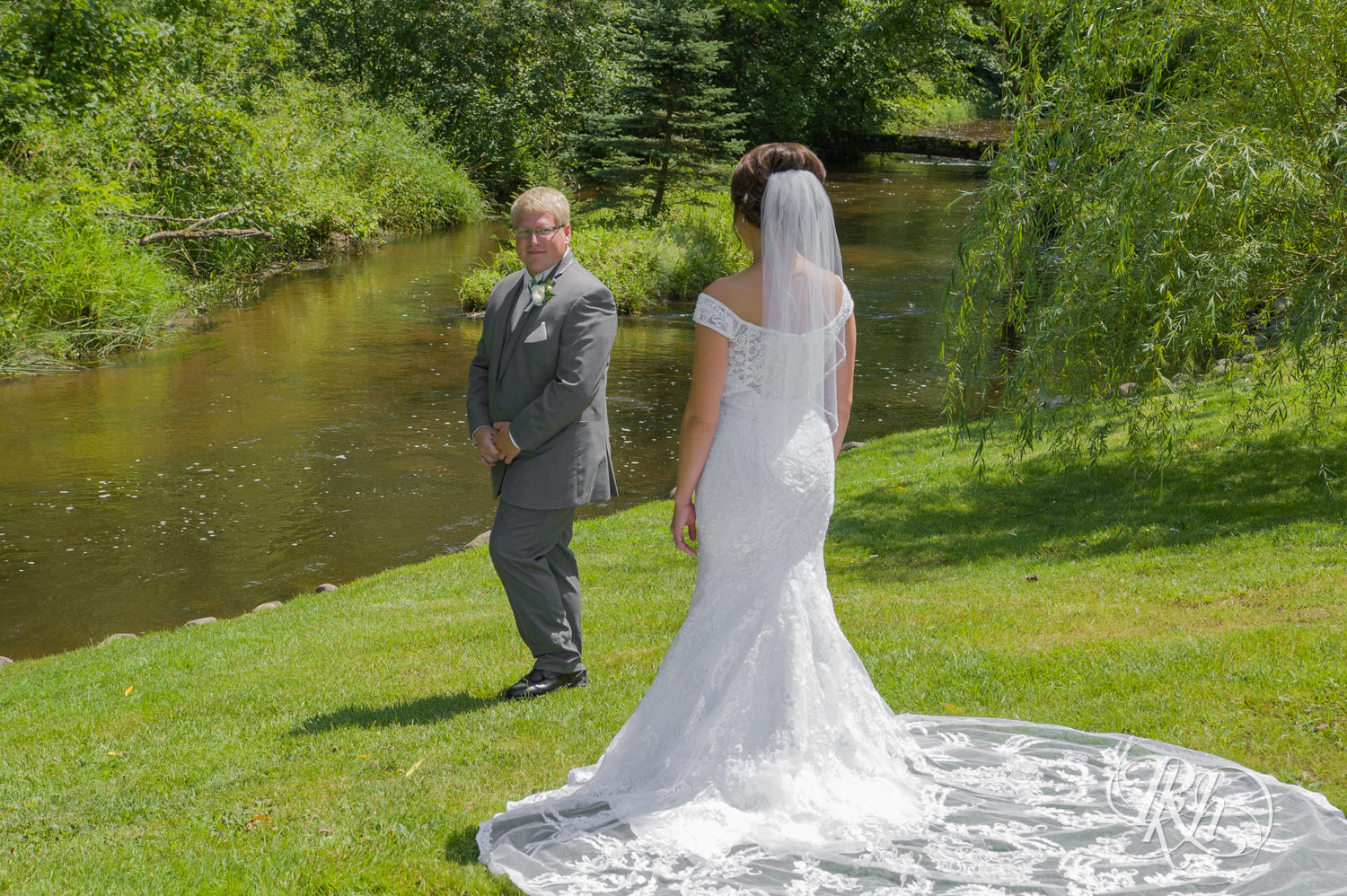 Bride and groom share first look at Creekside Farm Weddings and Events in Rush City, Minnesota.