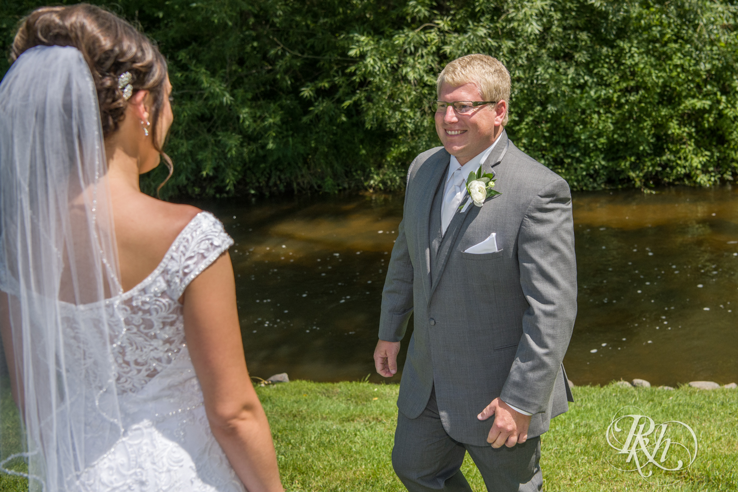 Bride and groom share first look at Creekside Farm Weddings and Events in Rush City, Minnesota.