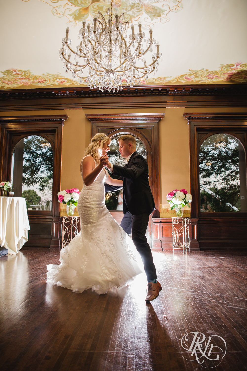 Bride and groom dance during wedding reception at the Semple Mansion in Minneapolis, Minnesota.