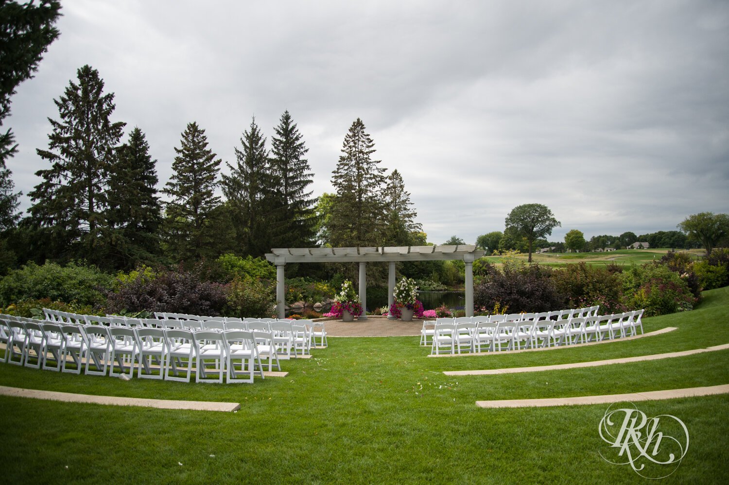 Outdoor fall ceremony setup at Olympic Hills Golf Club in Eden Prairie, Minnesota.