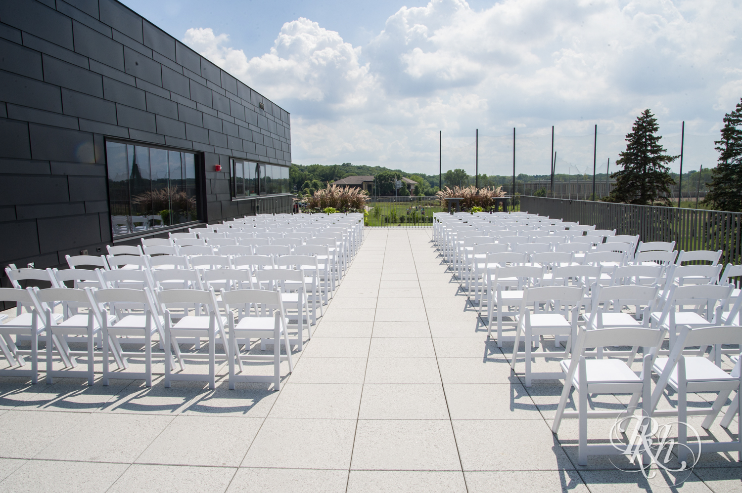 Outdoor summer wedding ceremony setup at Brookview Golf Course in Golden Valley, Minnesota.