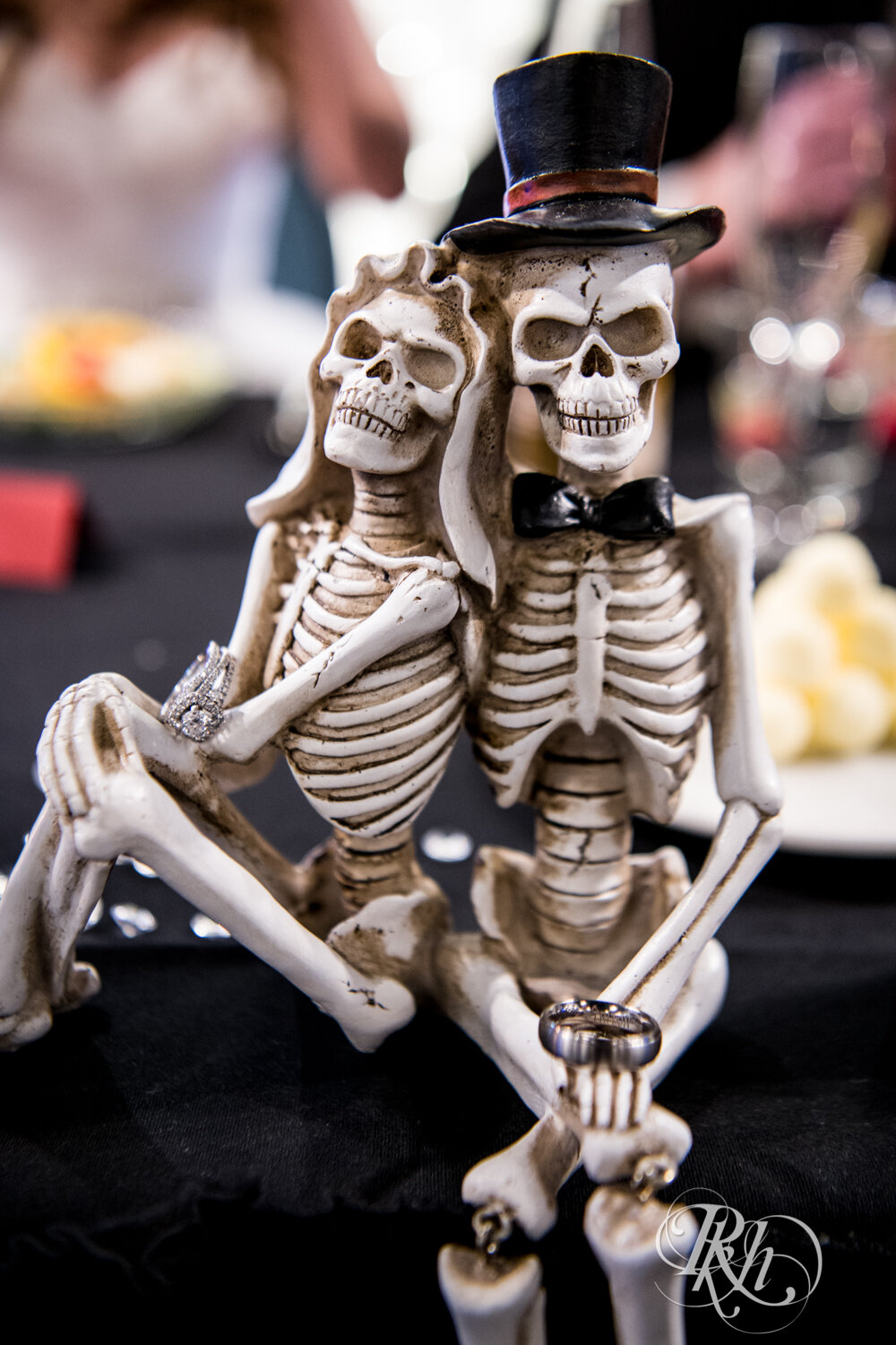 Wedding ring on Halloween skeleton statues at Rockwoods in Otsego, Minnesota.