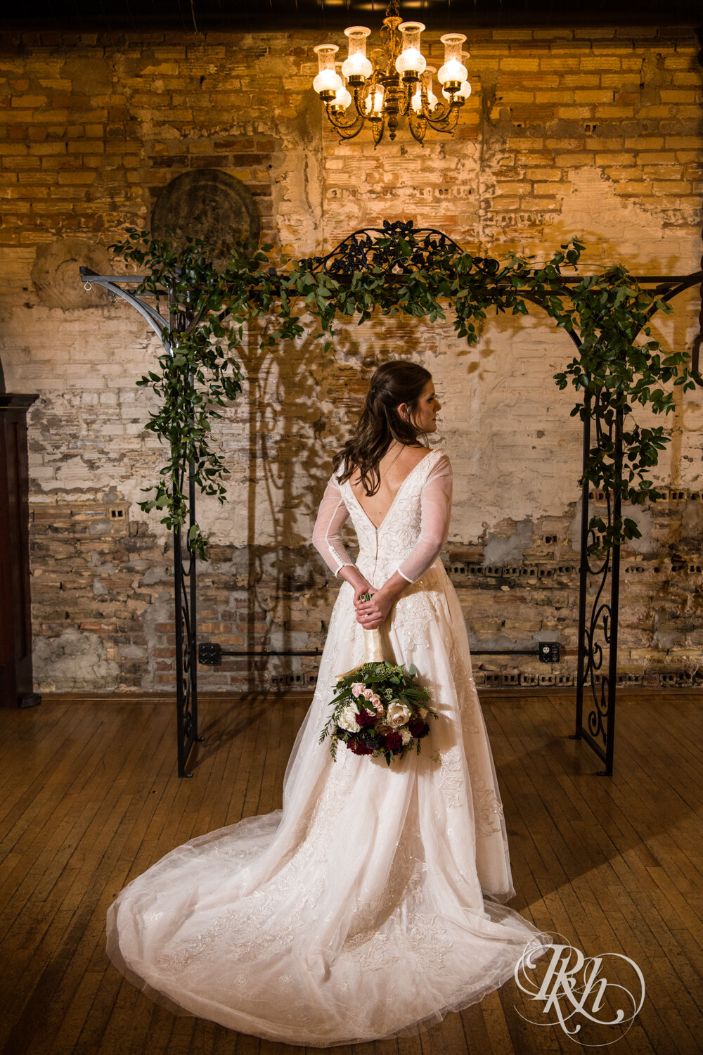 Bride holds flowers at Kellerman's Event Center in White Bear Lake, Minnesota.