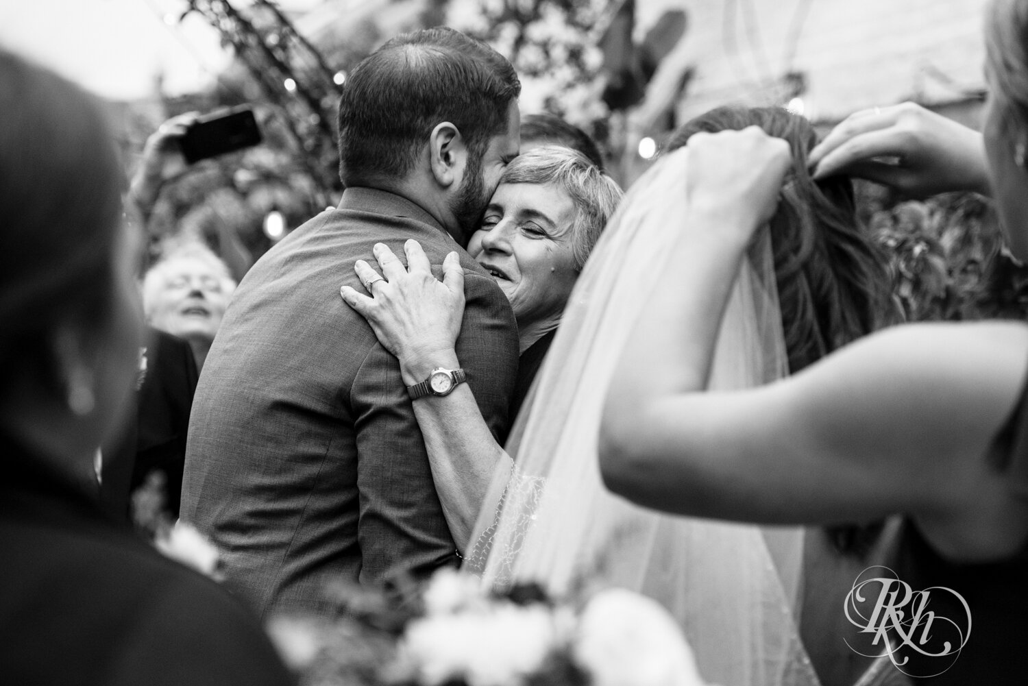 Groom hugs mom after wedding at Kellerman's Event Center in White Bear Lake, Minnesota.