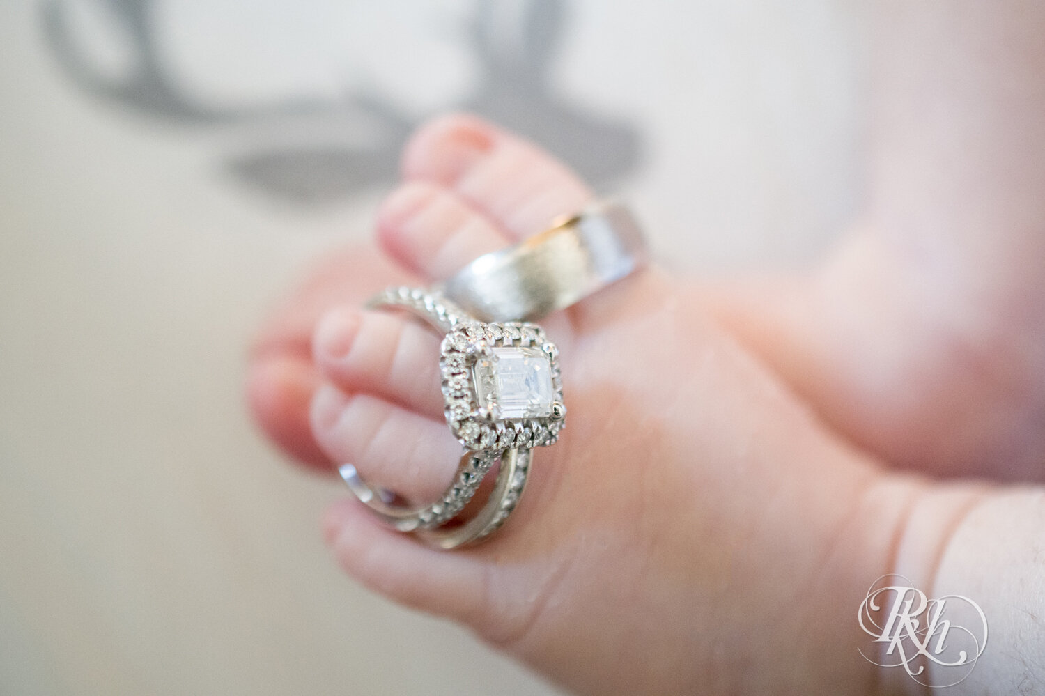 Wedding rings on baby toes