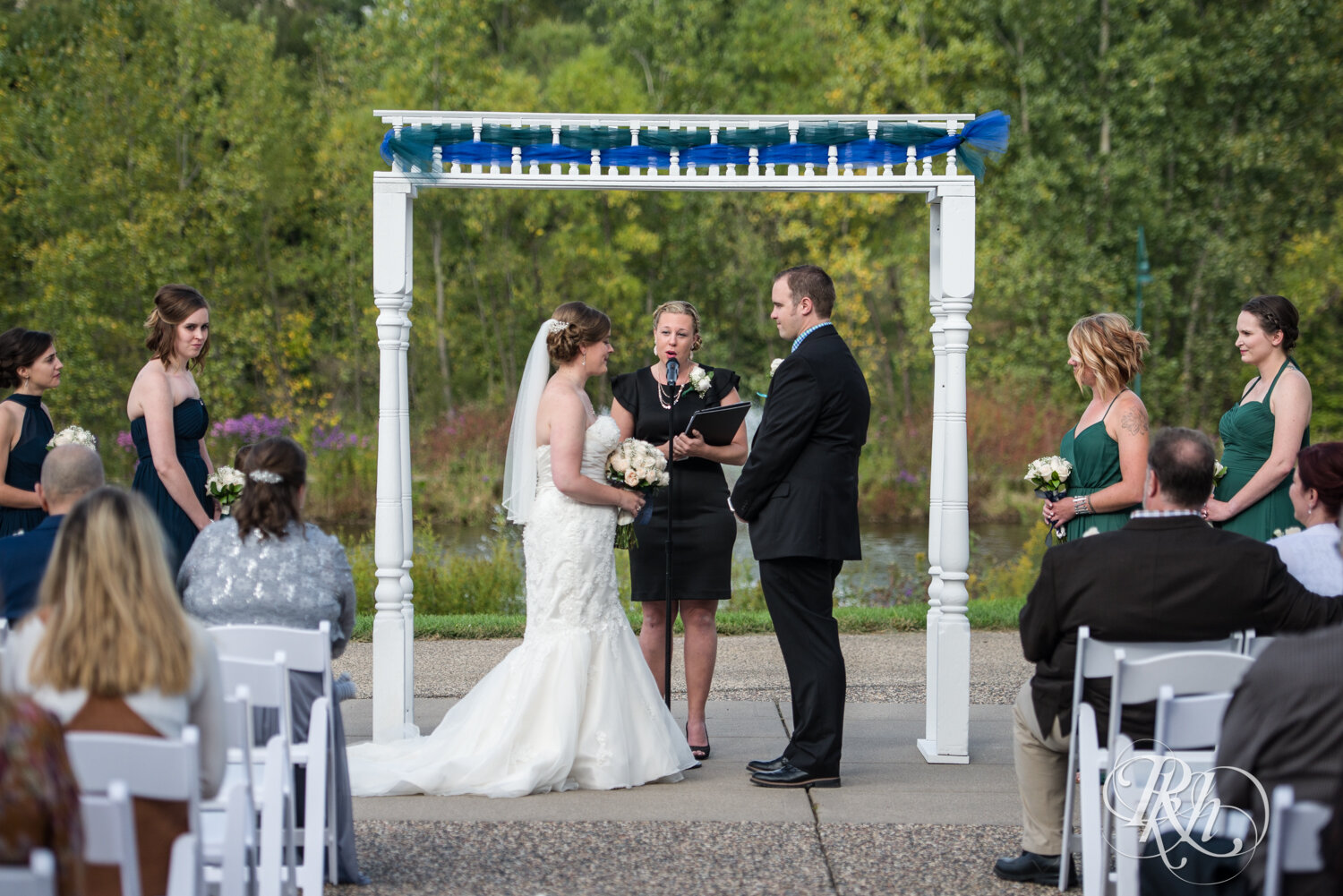 Bride and groom have outdoor ceremony at Eagan Community Center in Eagan, Minnesota.