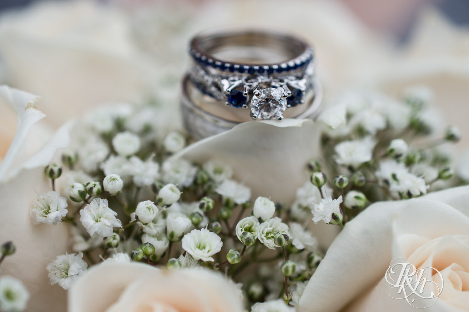 Wedding ring with sapphires in flowers at Eagan Community Center in Eagan, Minnesota.