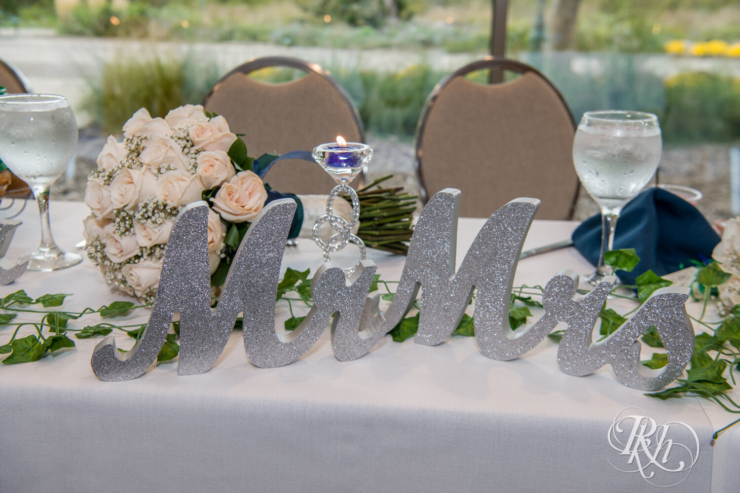 Wedding reception with green and blue accents at Eagan Community Center in Eagan, Minnesota.