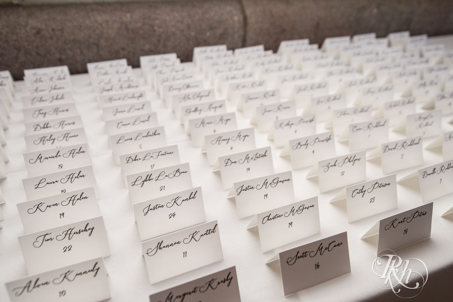 Table of wedding place cards in Minneapolis City Hall in Minneapolis, Minnesota.