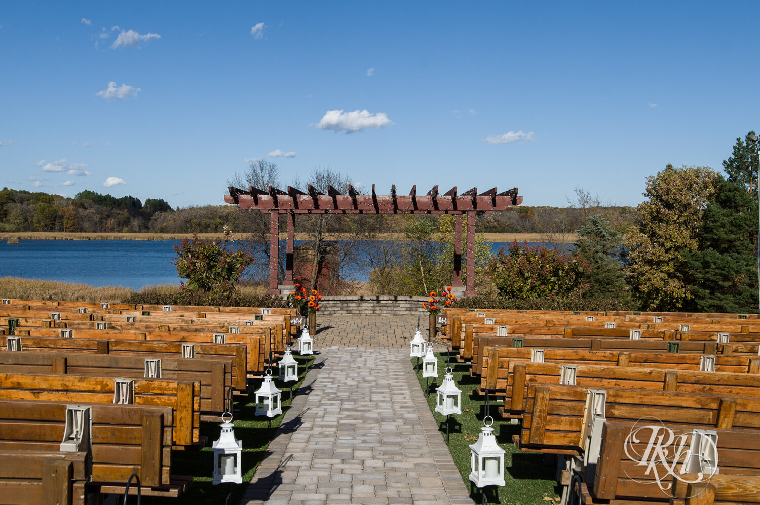 Outdoor wedding ceremony setup at Minnesota Horse and Hunt Club in Prior Lake, Minnesota.