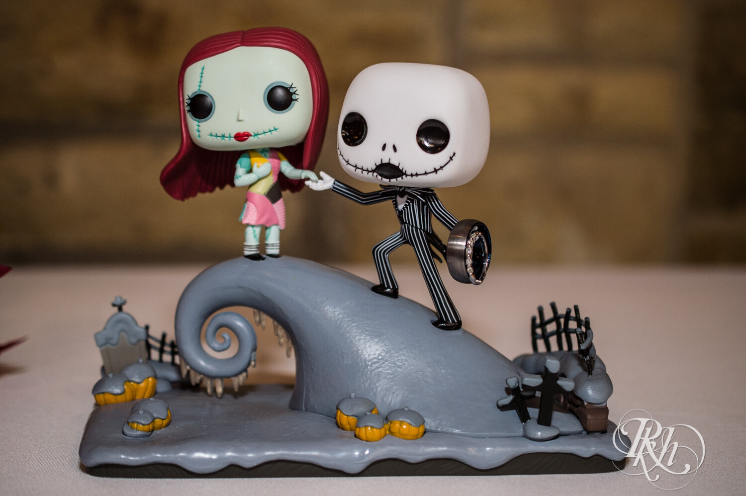 Wedding desert table with Nightmare Before Christmas topper at Olmsted County Fairgrounds in Rochester, Minnesota.