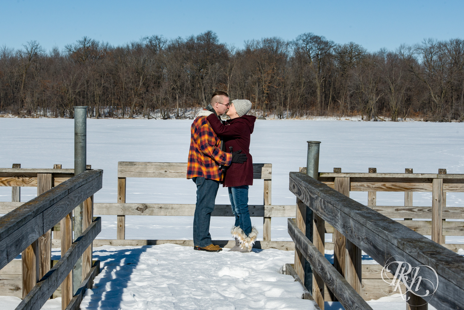 couple kissing on dock of Cleary Lake