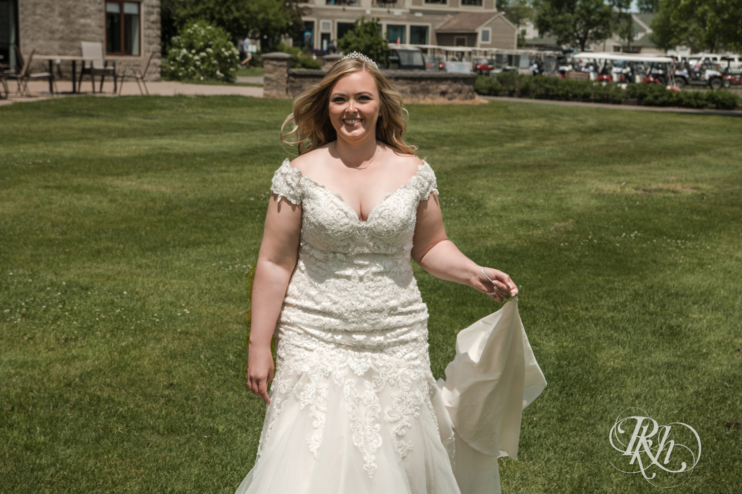 Bride and groom share first look at Izatys Resort in Onamia, Minnesota on a summer day.