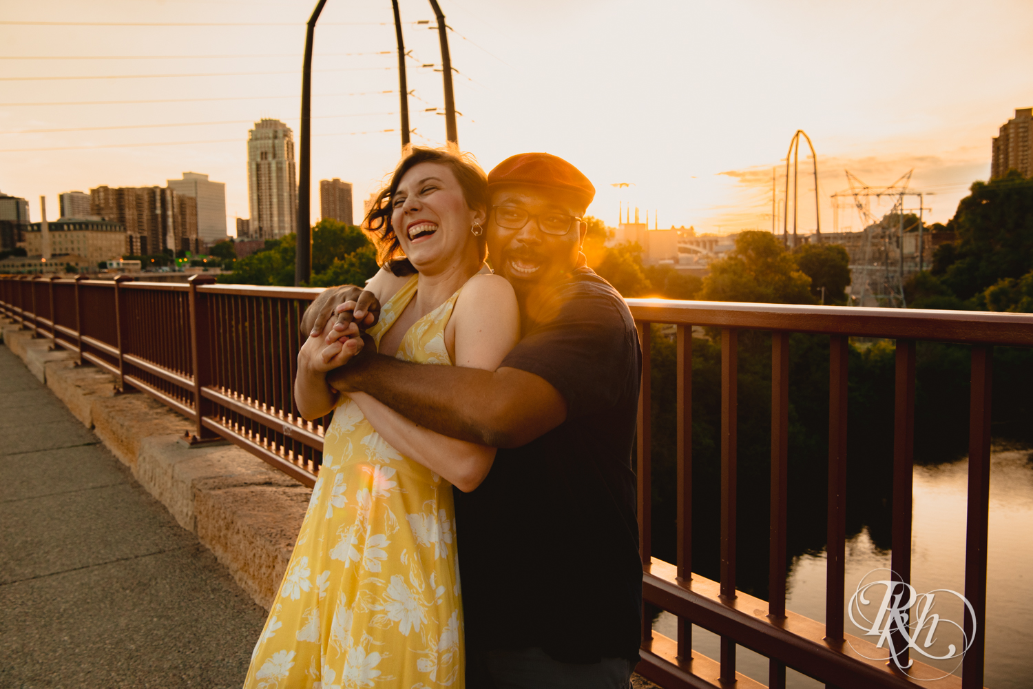 sunset photography stone arch bridge mixed race couple