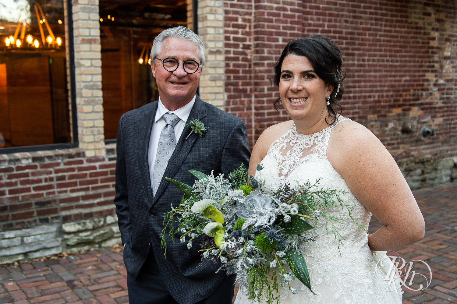 Bride walks down the aisle with dad at Minneapolis Event Centers in Minneapolis, Minnesota.