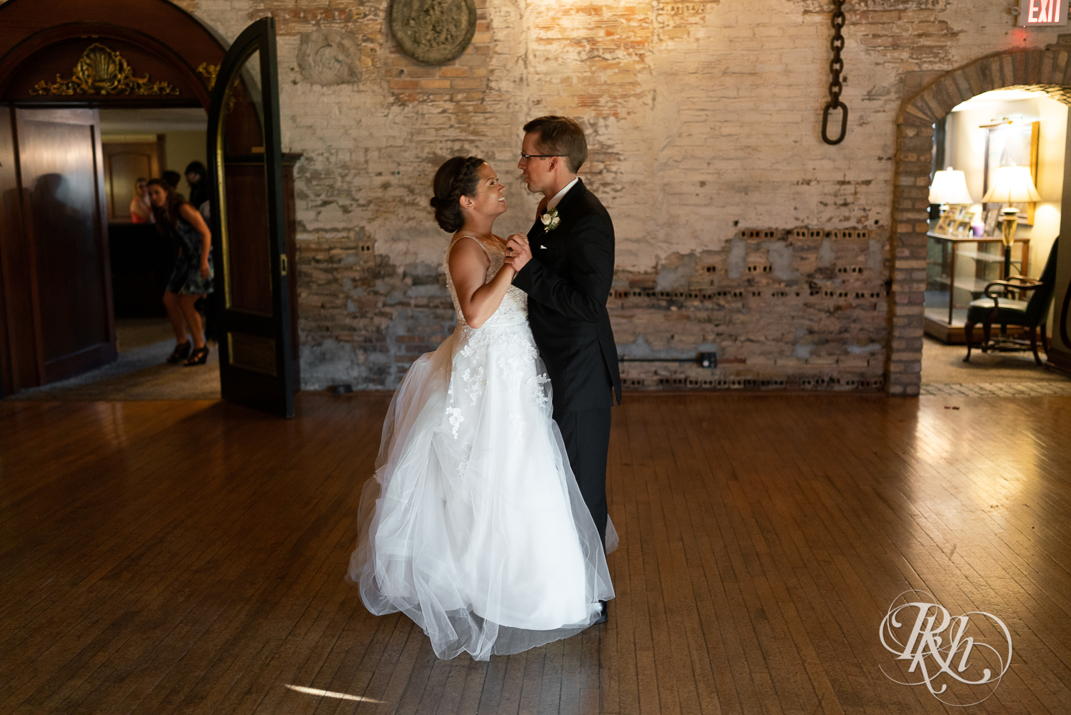 Bride and groom share first dance at wedding reception at Kellerman's Event Center in White Bear Lake, Minnesota.