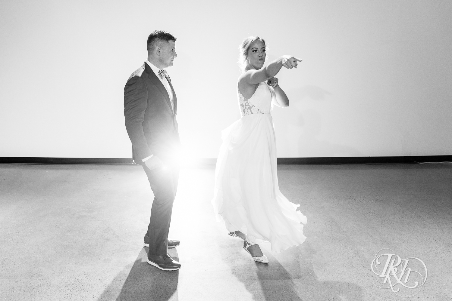 Bride and groom share first dance during wedding at Saint Paul Event Center in Saint Paul, Minnesota.