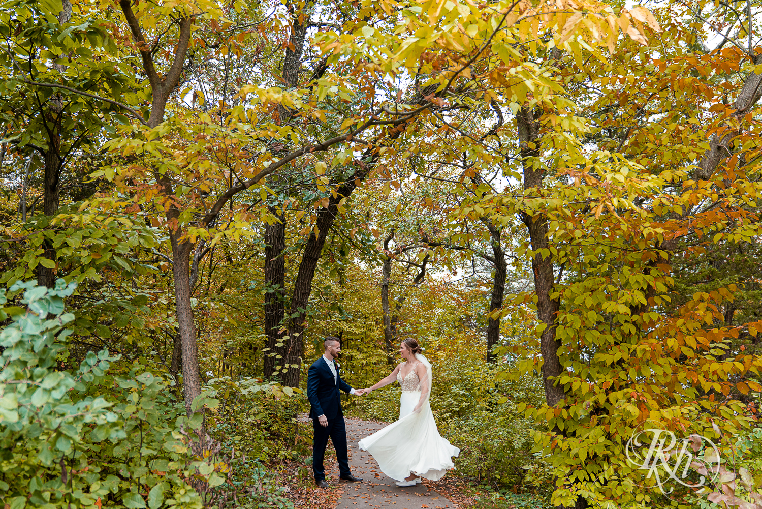 Bride and groom dancing in the woods at Schaar's Bluff in Hastings, Minnesota. 