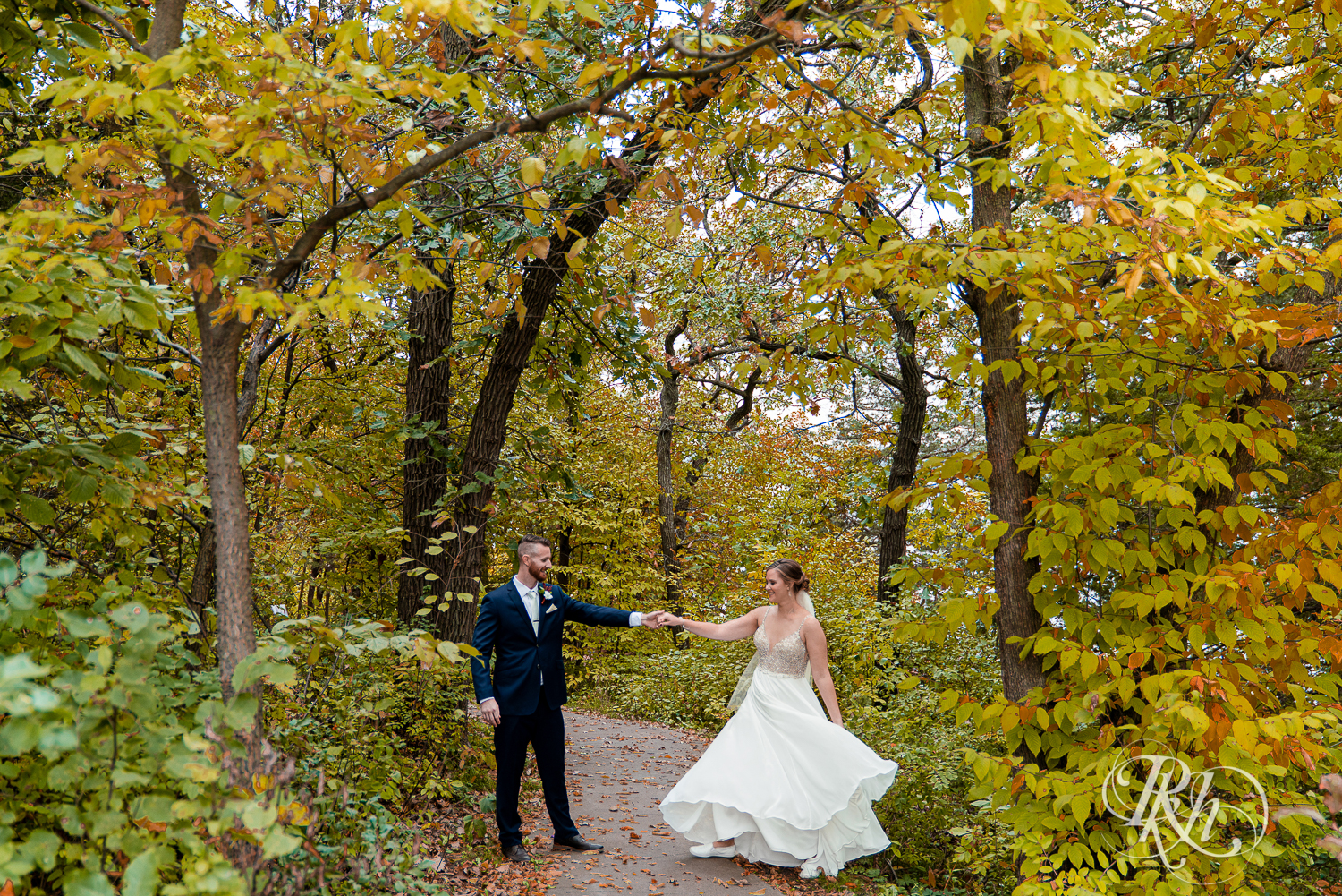 Bride and groom dancing in the woods at Schaar's Bluff in Hastings, Minnesota. 