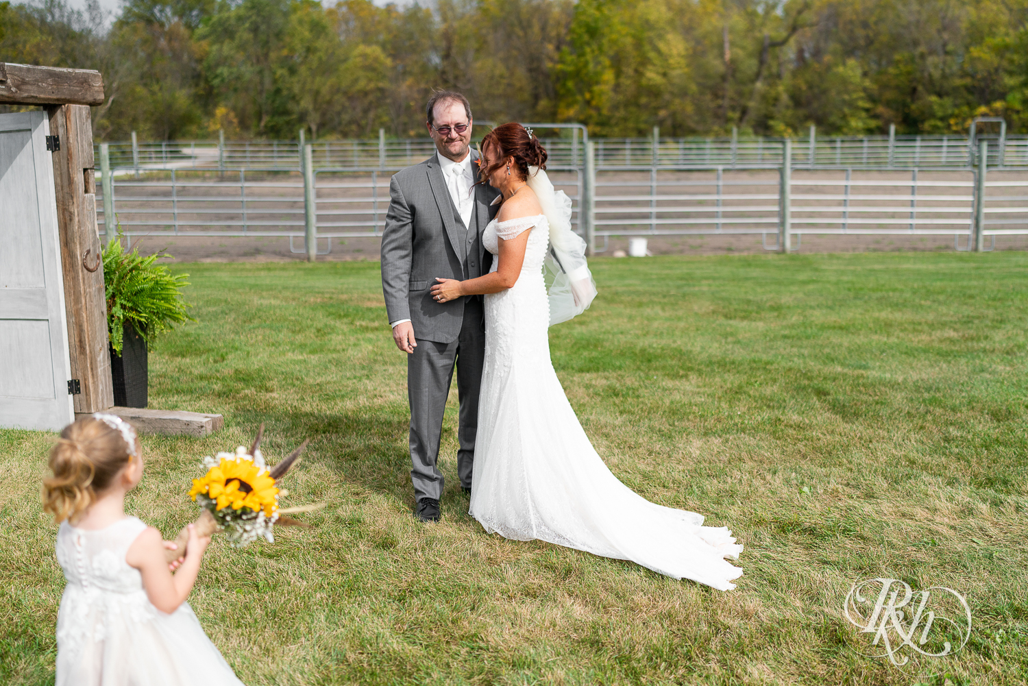 First look between bride and groom at Barn at Crocker's Creek in Faribault, Minnesota.