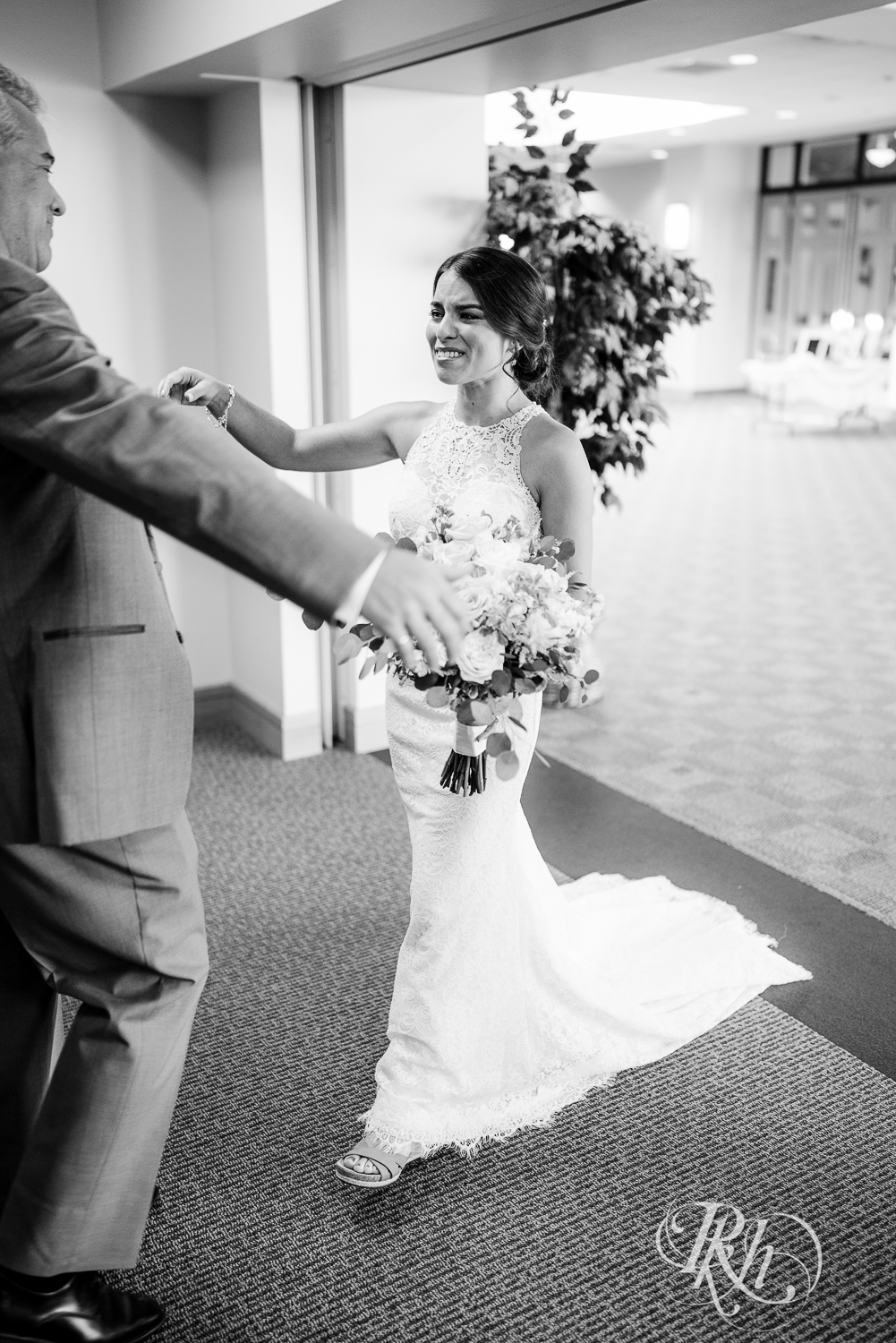 First look with bride and father at Saint Joseph Catholic Church in Rosemount, Minnesota.