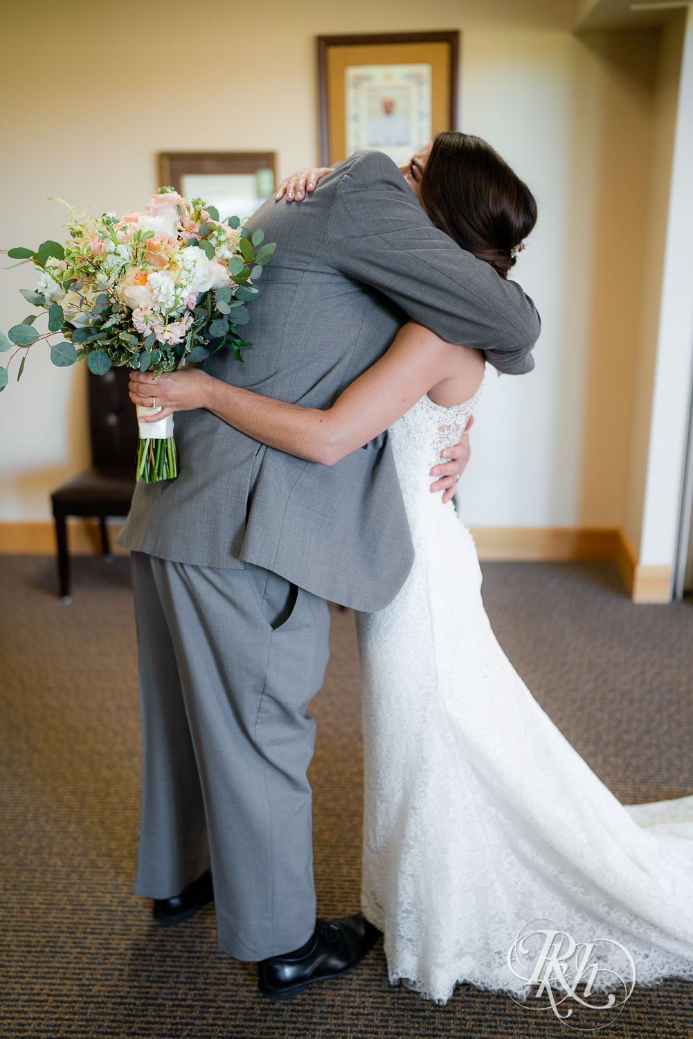 First look with bride and father at Saint Joseph Catholic Church in Rosemount, Minnesota.