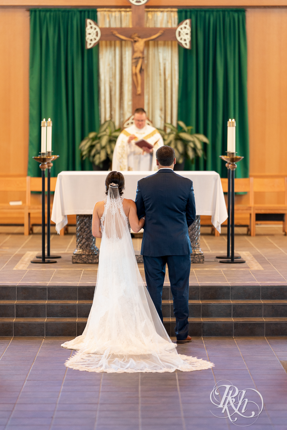 Catholic wedding ceremony at Saint Joseph Catholic Church in Rosemount, Minnesota.
