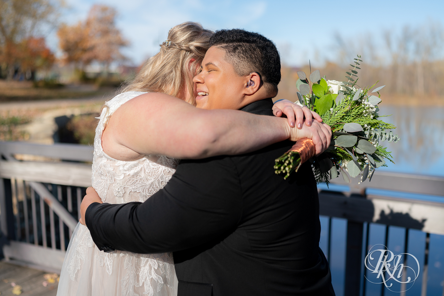 First look between lesbian brides at the Eagan Community Center in Eagan, Minnesota.