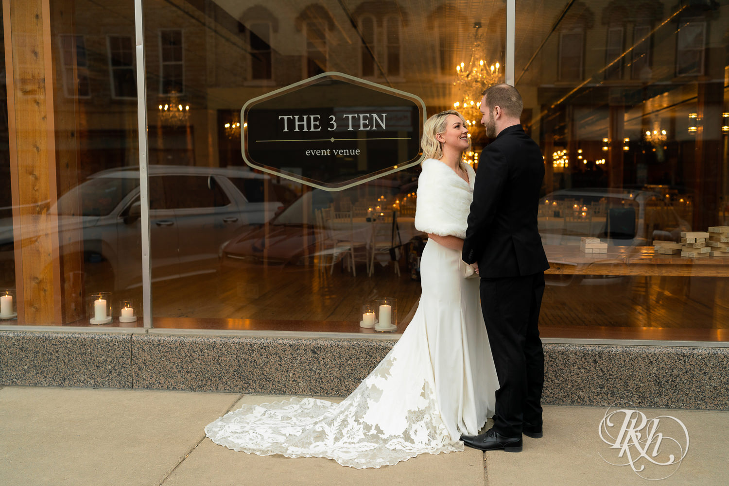 Bride and groom in front of 3 Ten Event Venue in Faribault, Minnesota.