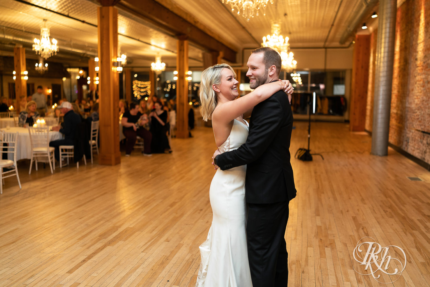 Bride and groom share first dance in 3 Ten Event Venue in Faribault, Minnesota.