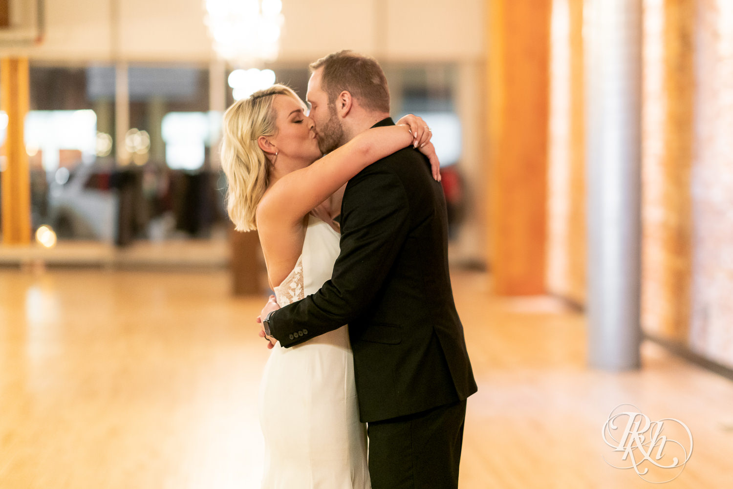 Bride and groom share first dance in 3 Ten Event Venue in Faribault, Minnesota.