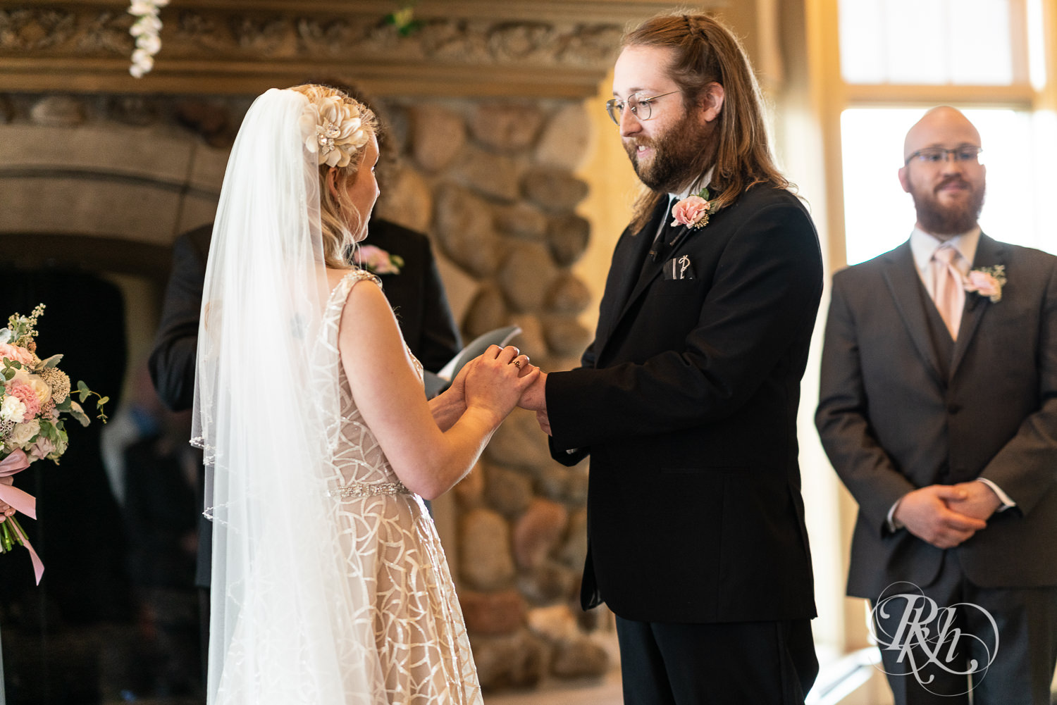 Indoor wedding ceremony takes place at Rush Creek Golf Club in Maple Grove, Minnesota.
