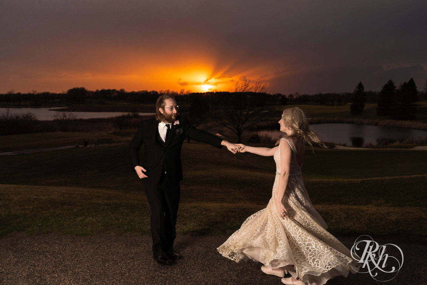 Bride and groom dance at sunset at Rush Creek Golf Club in Maple Grove, Minnesota.