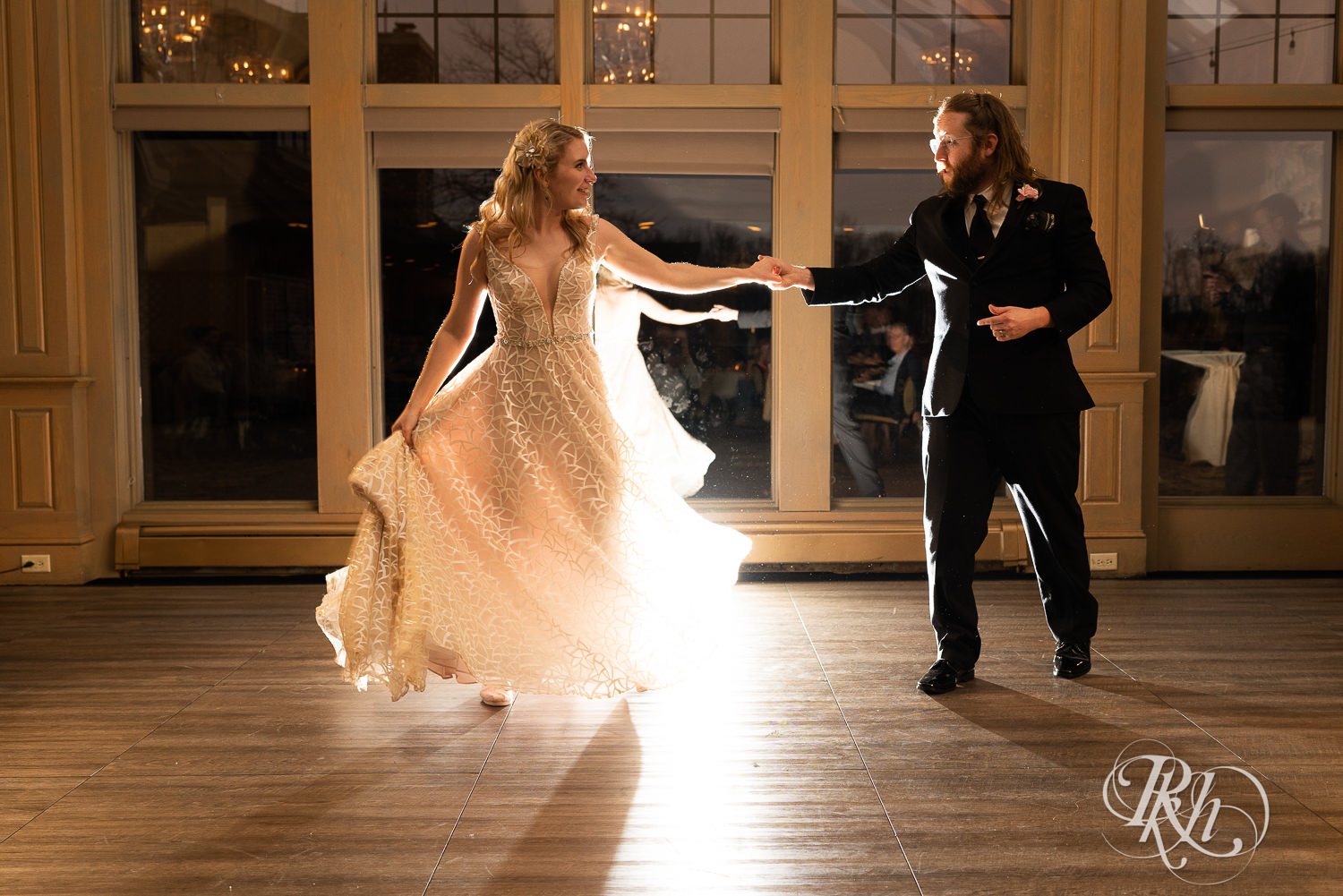 Bride and groom share first dance at Rush Creek Golf Club in Maple Grove, Minnesota.