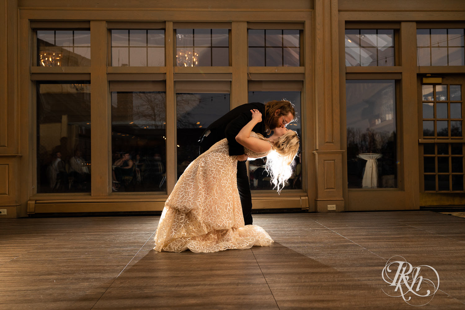 Bride and groom share first dance at Rush Creek Golf Club in Maple Grove, Minnesota.