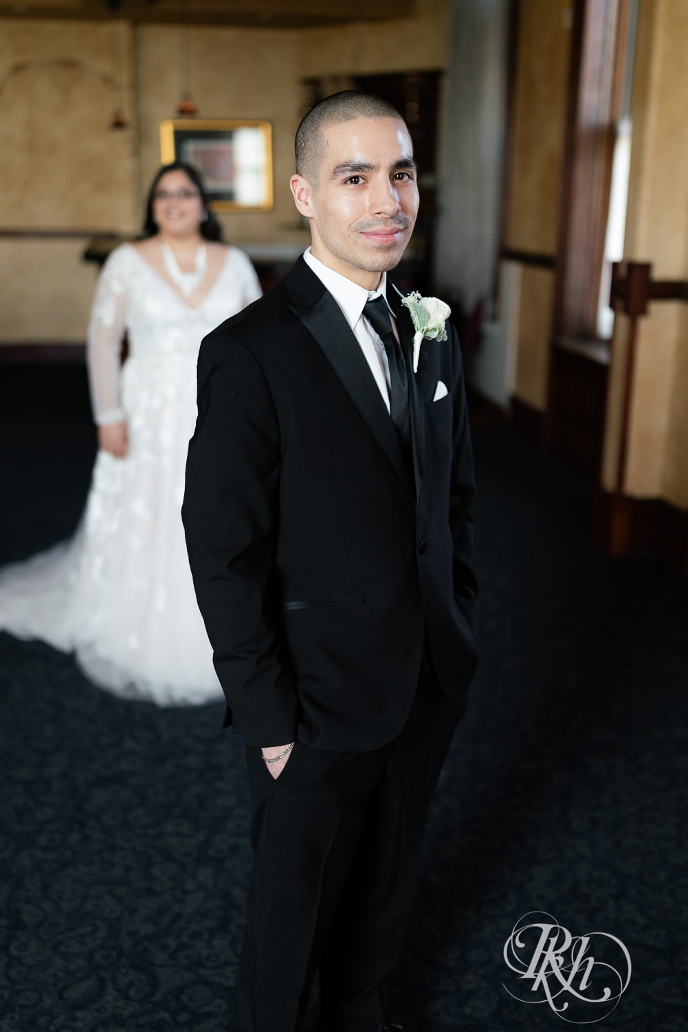 First look between bride and groom at the Historic Concord Exchange in Saint Paul, Minnesota.