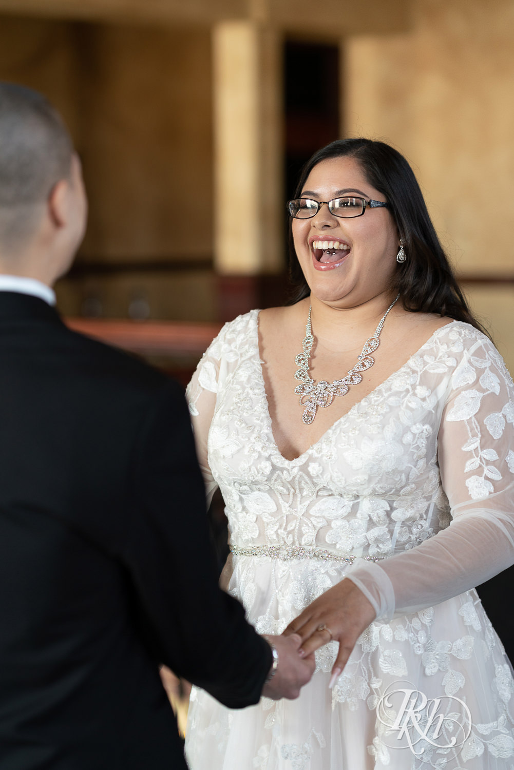 First look between bride and groom at the Historic Concord Exchange in Saint Paul, Minnesota.