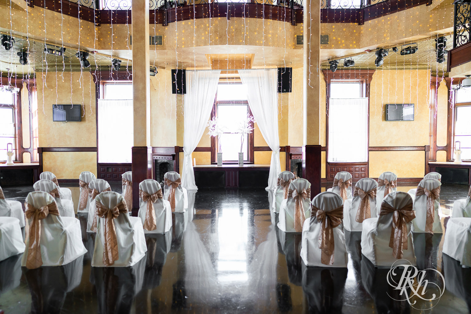 Indoor wedding ceremony setup at the Historic Concord Exchange in Saint Paul, Minnesota.