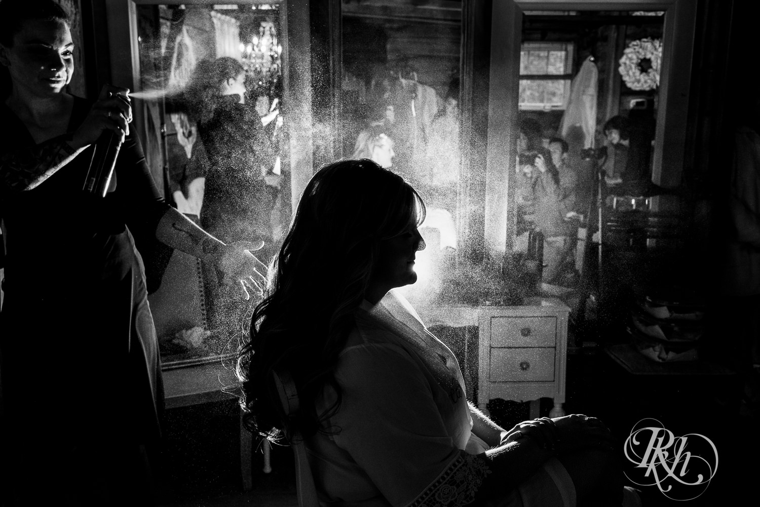 Bride getting ready before wedding at Hope Glen Farm in Cottage Grove, Minnesota.