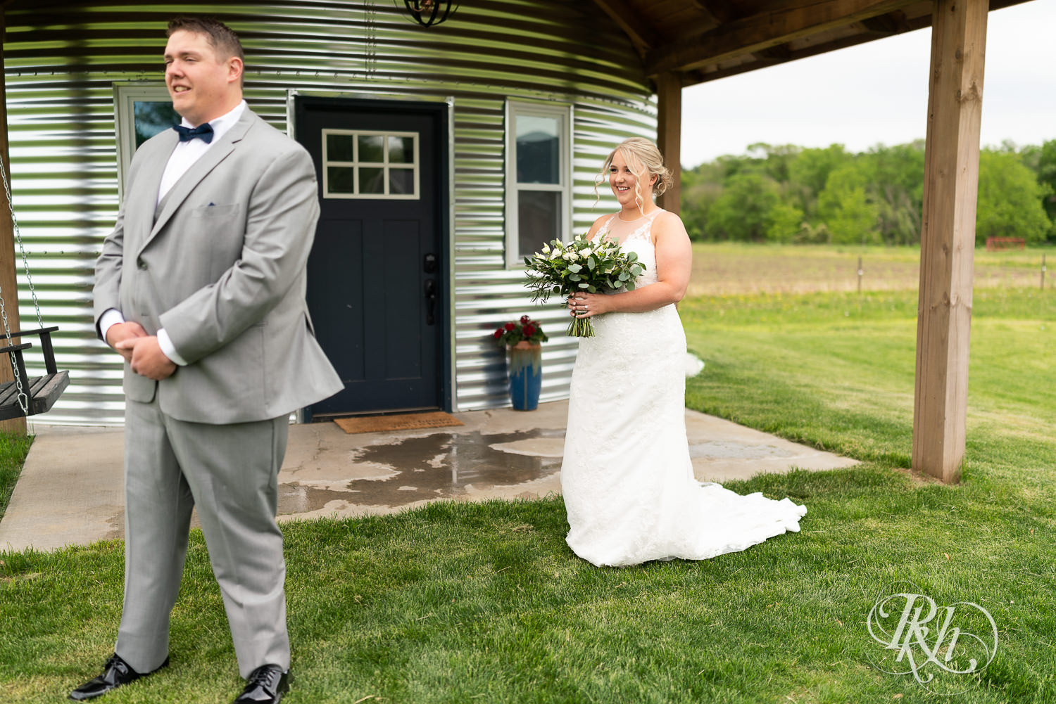 First look between bride and groom at Barn at Mirror Lake in Mondovi, Wisconsin.