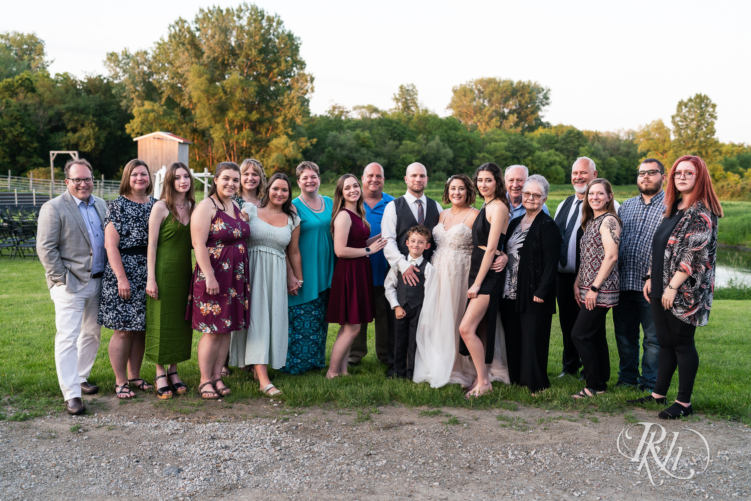 Extended family with bride and groom at Barn at Crocker's Creek in Faribault, Minnesota.