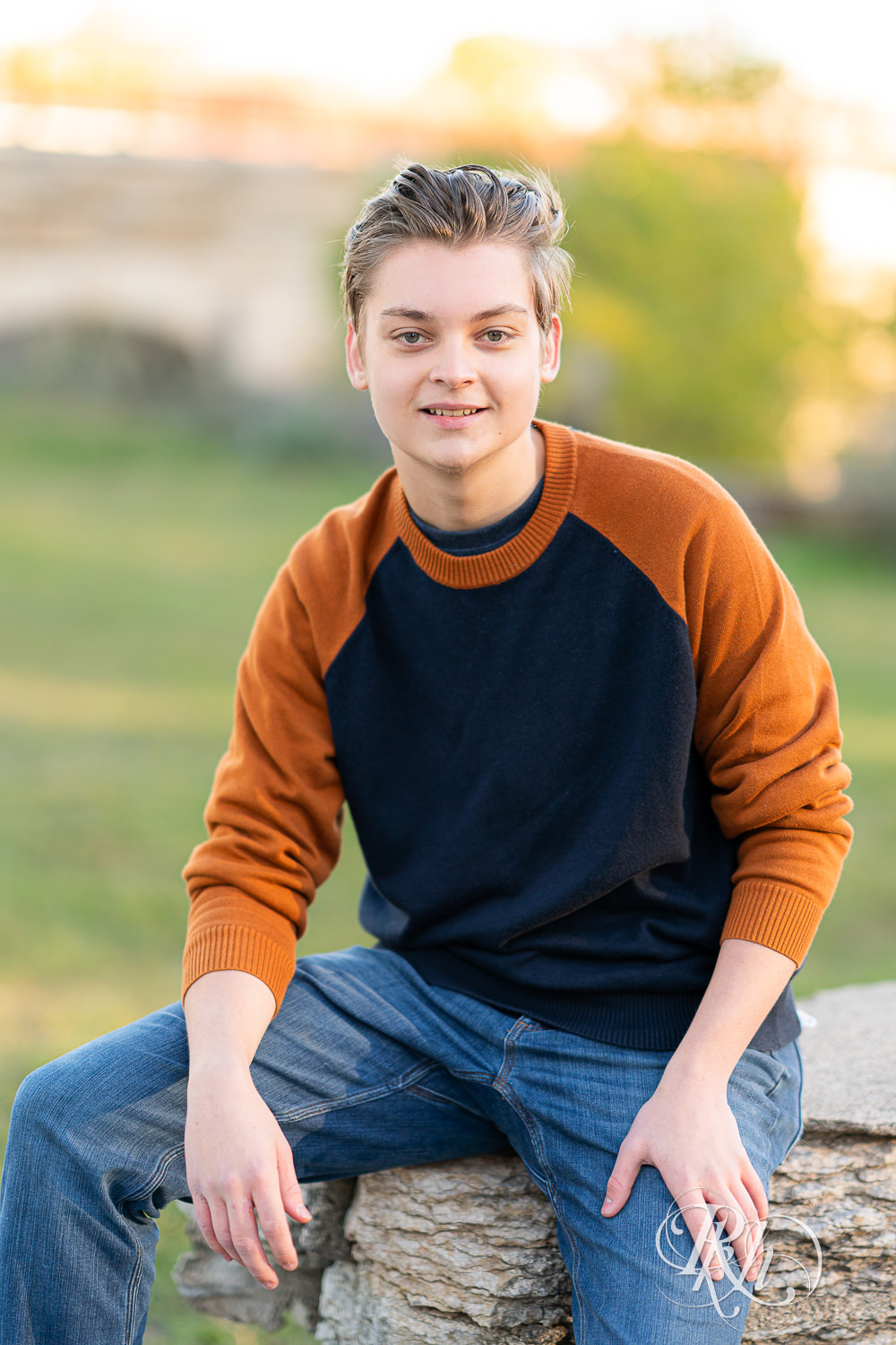 Senior boy looking at camera in Mill City Ruins in Minneapolis, Minnesota for senior photography